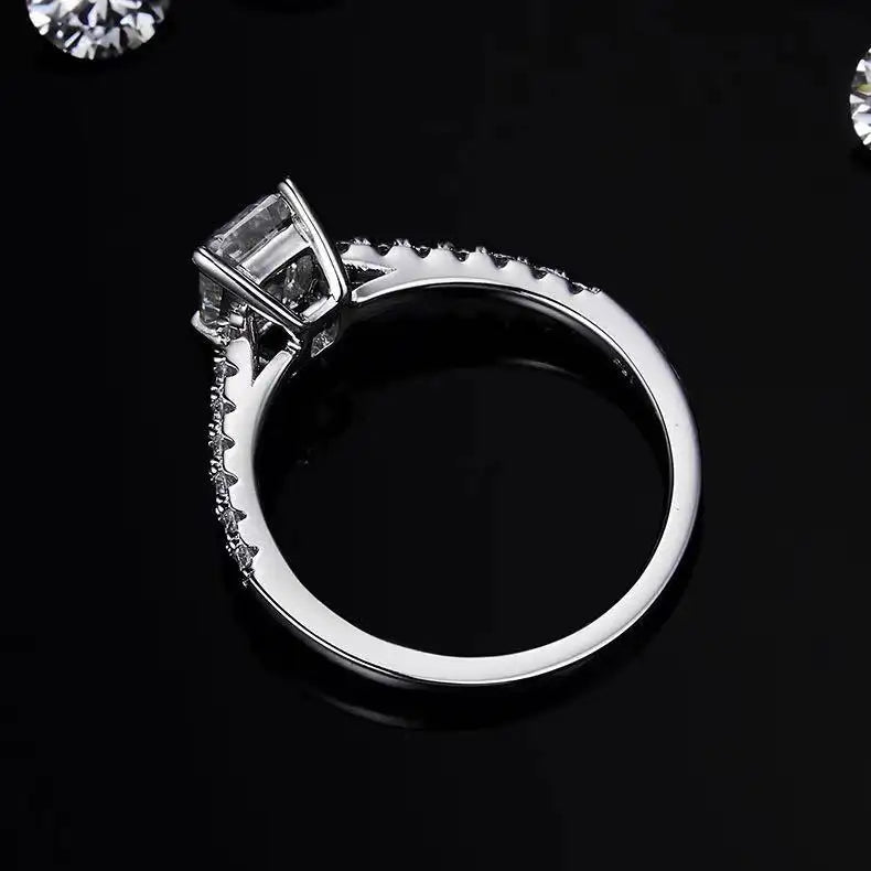 Elevé Basket Set 1.00ct Emerald Cut Moissanite Engagement Ring