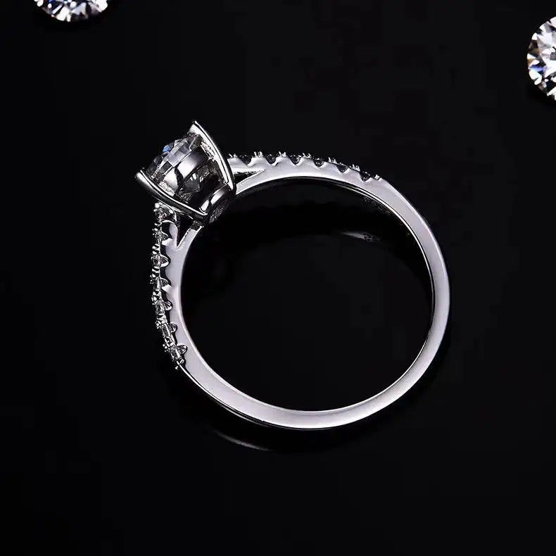 Elevé Basket Set 1.00ct Pear Shape Moissanite Engagement Ring