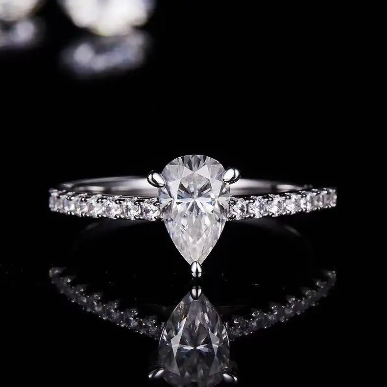 Elevé Basket Set 1.00ct Pear Shape Moissanite Engagement Ring