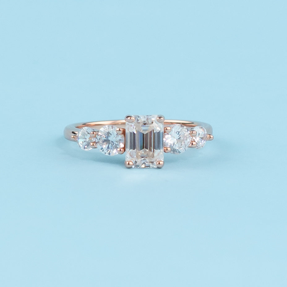 Five-Stone Emerald Cut Moissanite Engagement Ring Set in 9ct Rose Gold