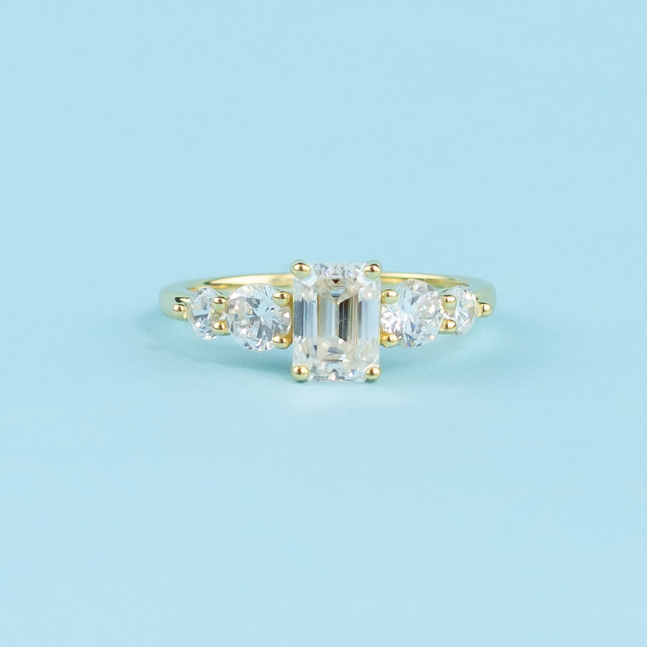 Five-Stone Emerald Cut Moissanite Engagement Ring Set in 9ct Yellow Gold