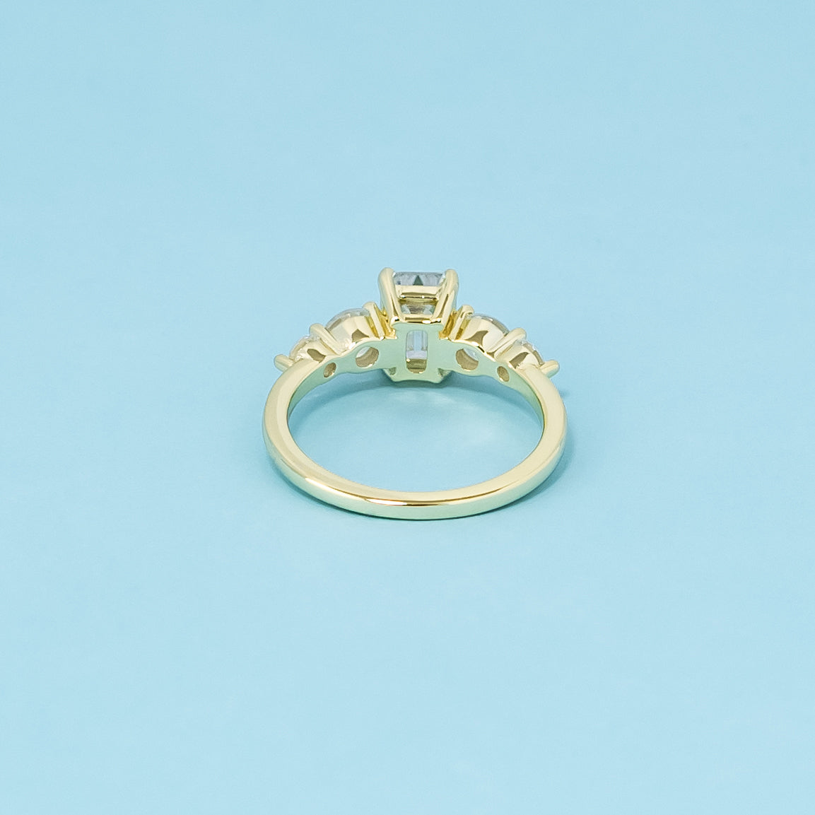 Five-Stone Emerald Cut Moissanite Engagement Ring Set in 9ct Yellow Gold