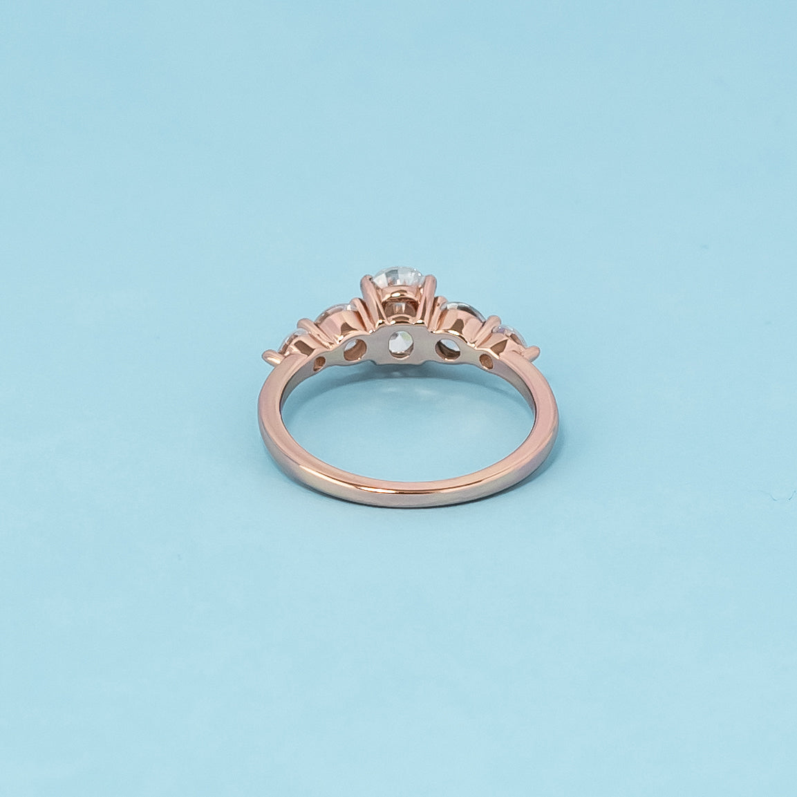 Five-Stone Oval Cut Moissanite Engagement Ring Set in 9ct Rose Gold