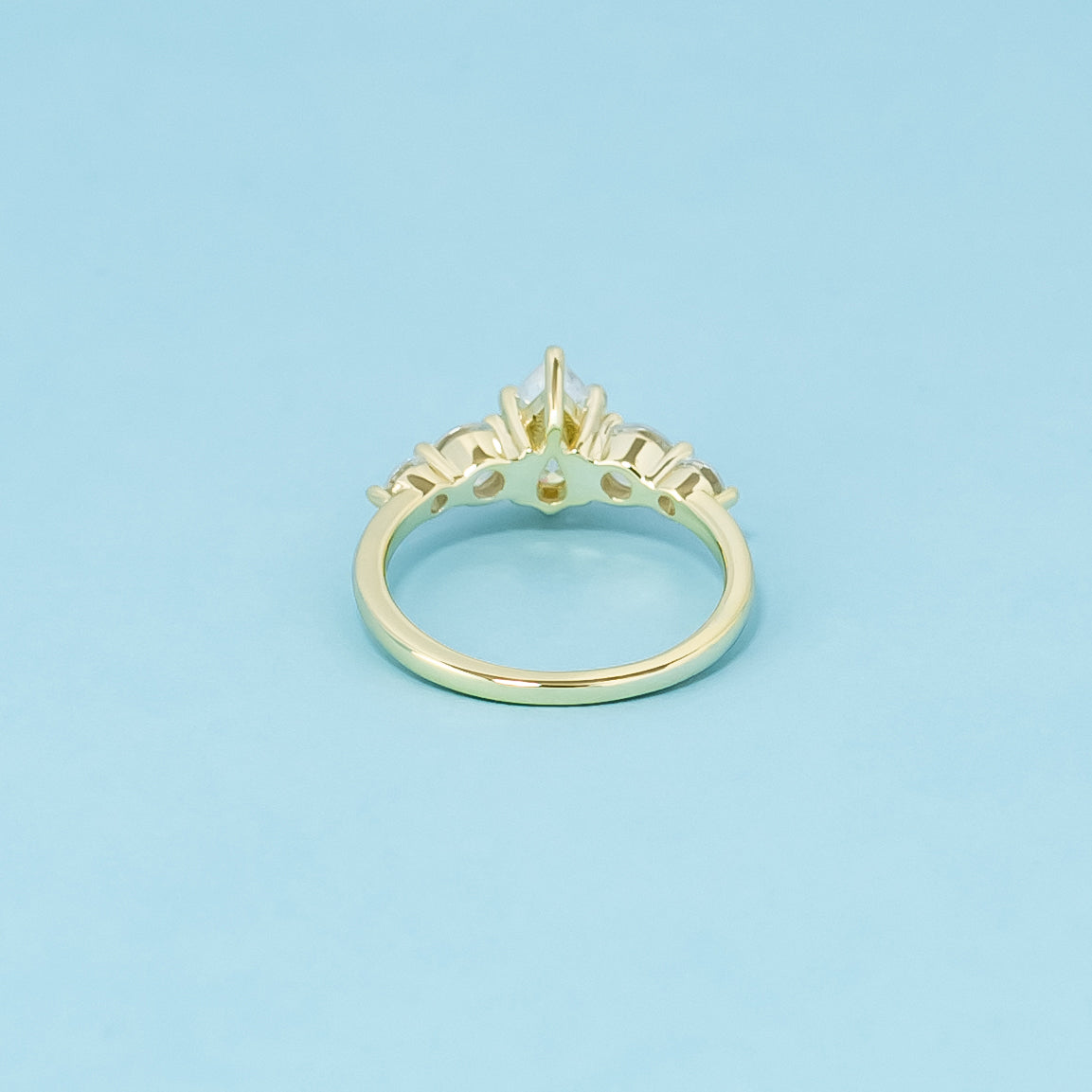 Five-Stone Pear Shape Moissanite Engagement Ring Set in 9ct Yellow Gold