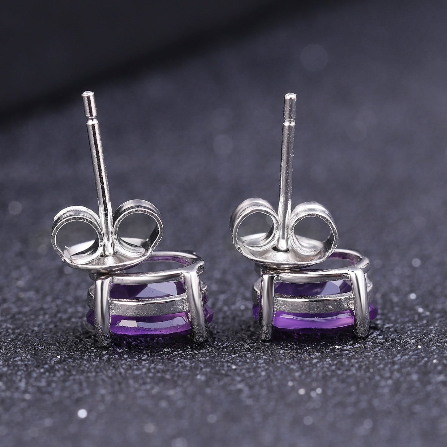 Amethyst 0.49ct Oval-Cut Solitaire Stud Earrings