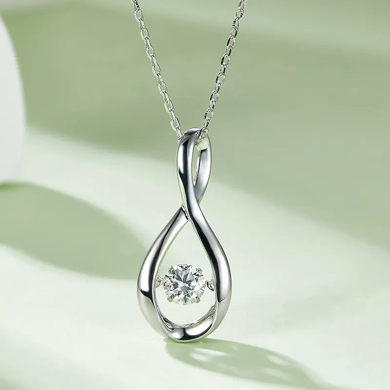 Spiral Dancing Moissanite Pendant Set in Sterling Silver