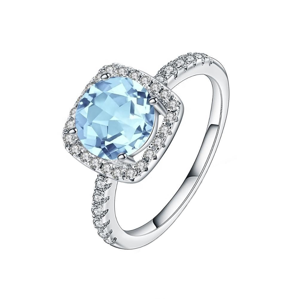 Heritage Blue Topaz Halo Ring - Round Brilliant Cut