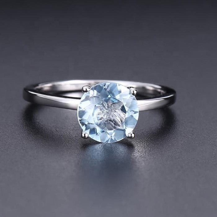Heritage 4 Claw Blue Topaz Solitaire Ring