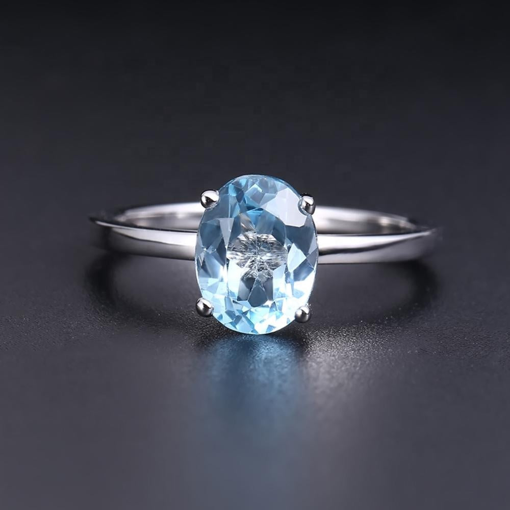 Blue Topaz Solitaire Ring - Oval Cut