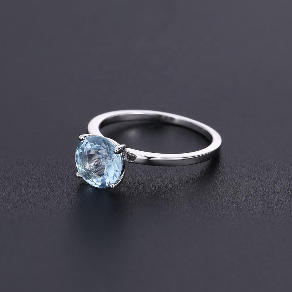 Heritage 4 Claw Blue Topaz Solitaire Ring