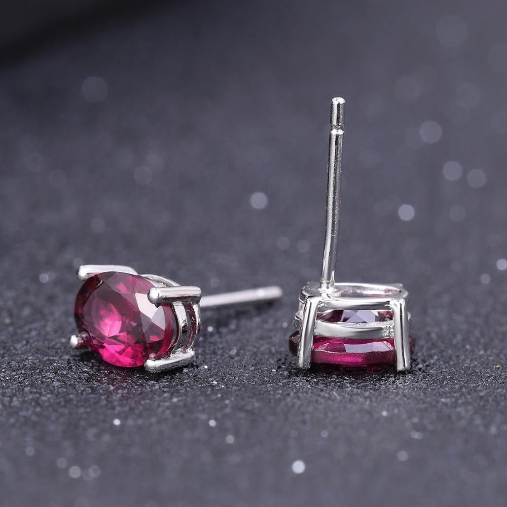 Rhodolite Garnet 0.60ct Oval-Cut Solitaire Stud Earrings