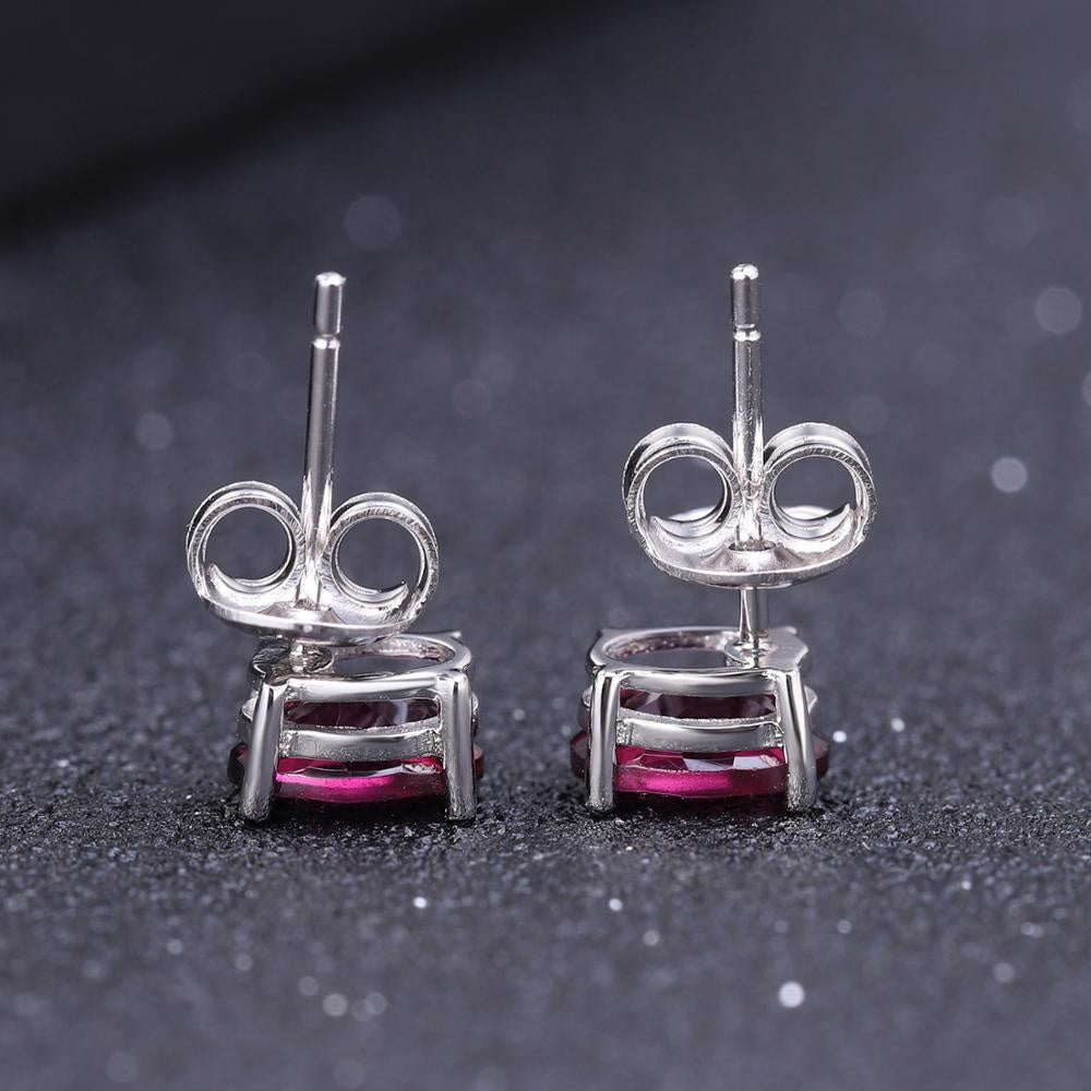 Rhodolite Garnet 0.60ct Oval-Cut Solitaire Stud Earrings