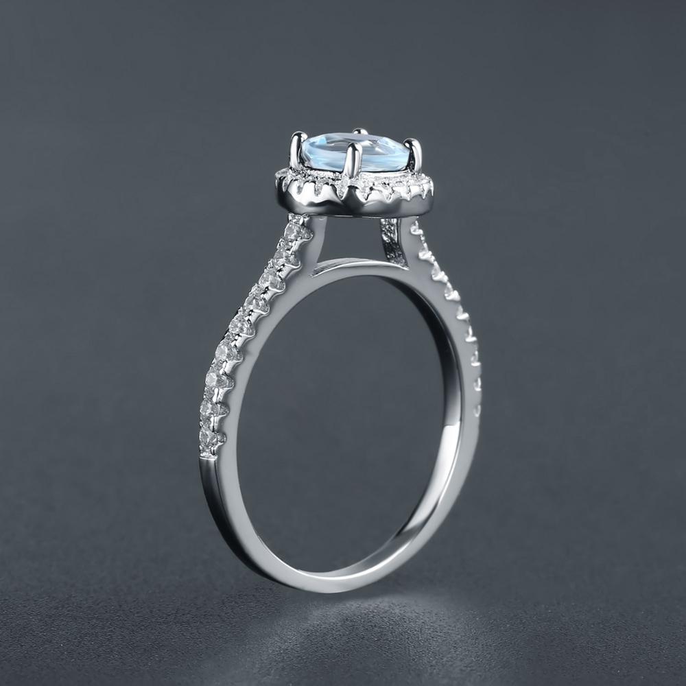 Heritage Blue Topaz Halo Ring - Oval Cut