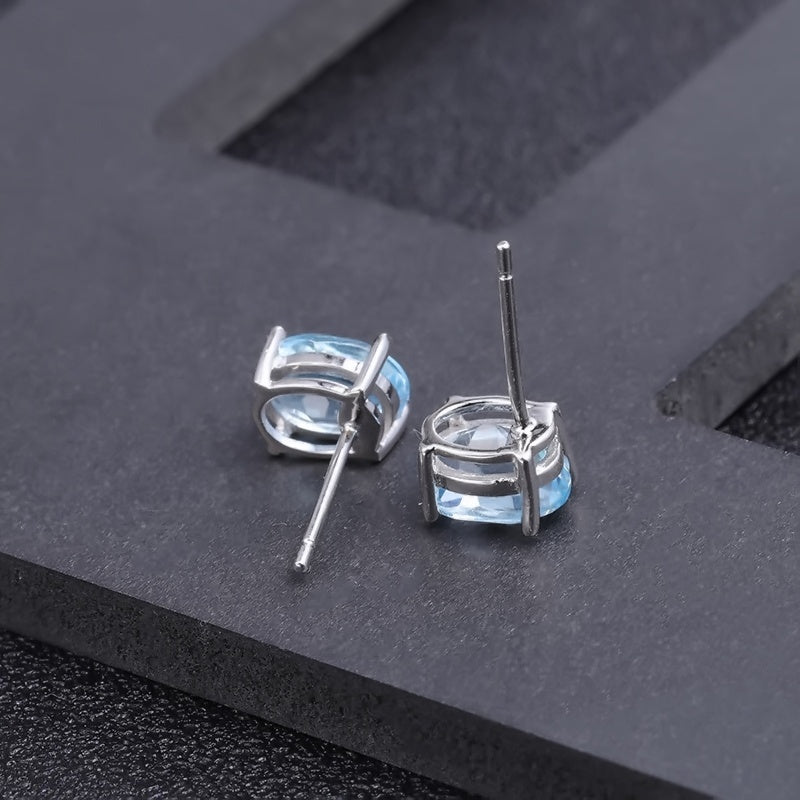 Blue Topaz 0.60ct Oval-Cut Solitaire Stud Earrings