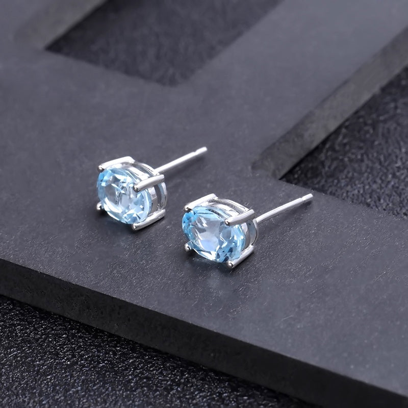 Blue Topaz 0.60ct Oval-Cut Solitaire Stud Earrings