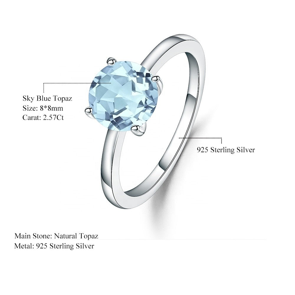 Heritage 4 Claw Blue Topaz Solitaire Ring