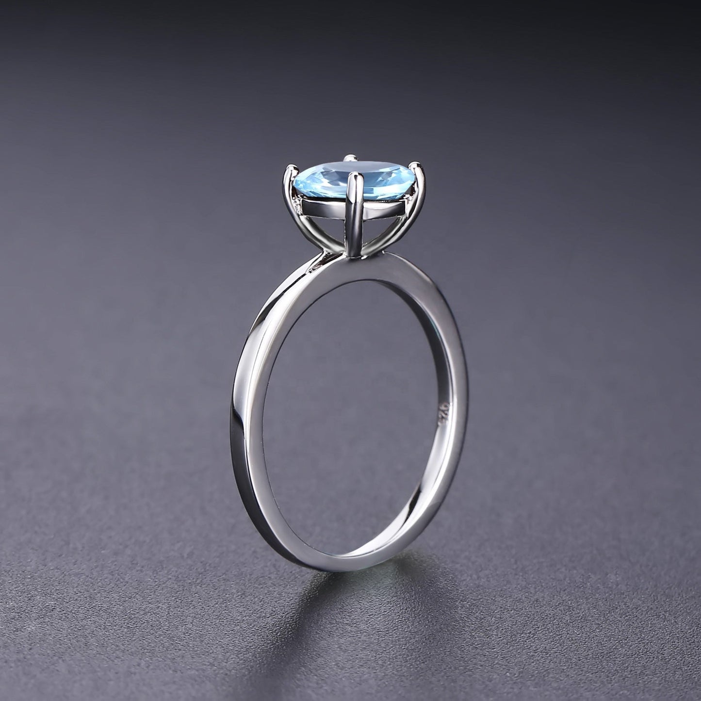 Heritage 4 Claw Blue Topaz Solitaire Ring