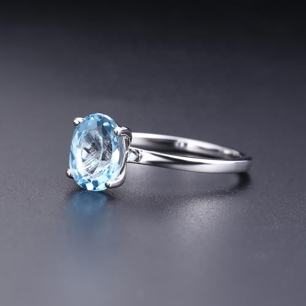 Blue Topaz Solitaire Ring - Oval Cut