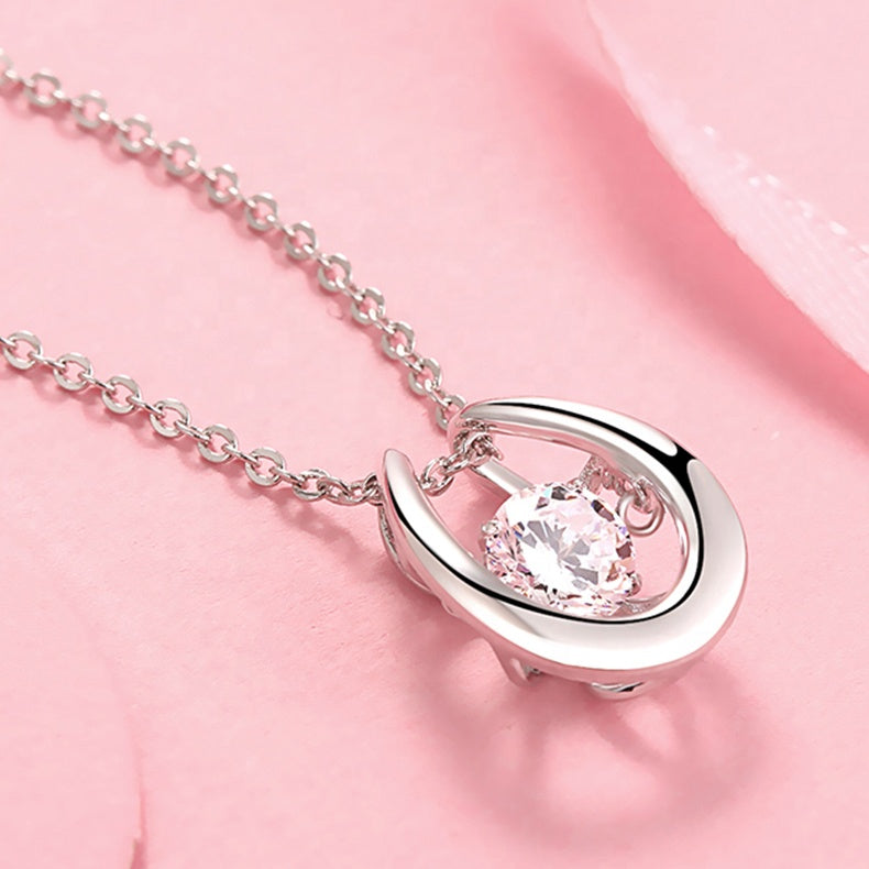 Heritage Dancing Moissanite Pendant Set in Sterling Silver