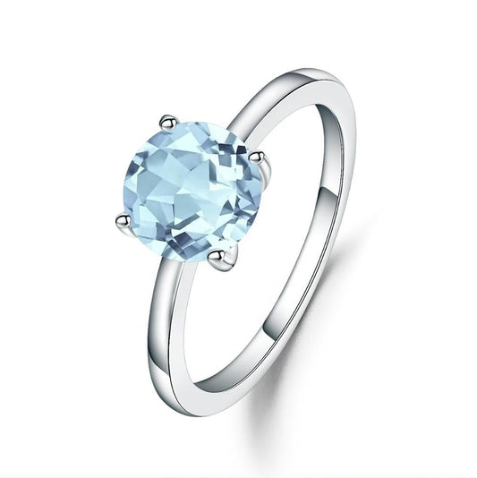 Heritage 4 Claw Blue Topaz Solitaire Ring