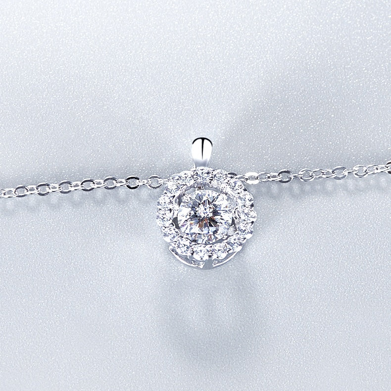 Halo Dancing Moissanite Pendant Set in Sterling Silver