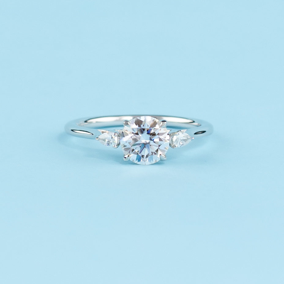 Trinity Round Brilliant Moissanite Engagement Ring Set in 9ct White Gold