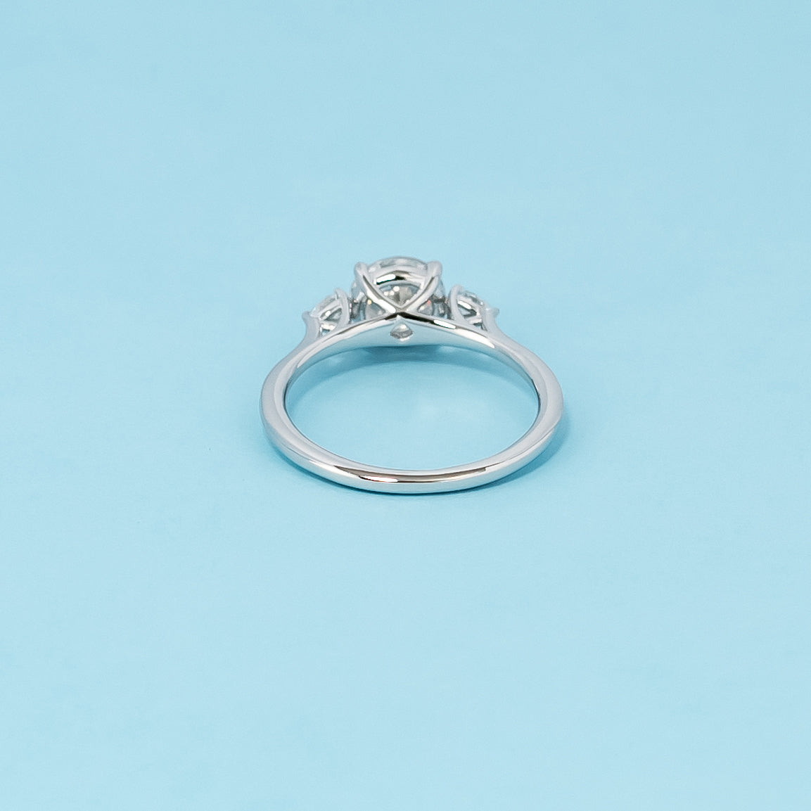 Trinity Round Brilliant Moissanite Engagement Ring Set in 9ct White Gold