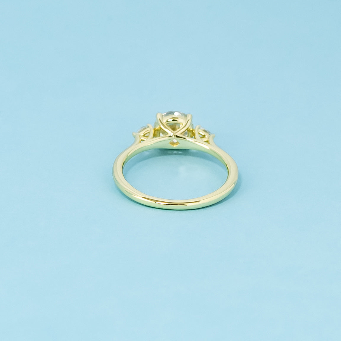 Trinity Round Brilliant Moissanite Engagement Ring Set in 9ct Yellow Gold