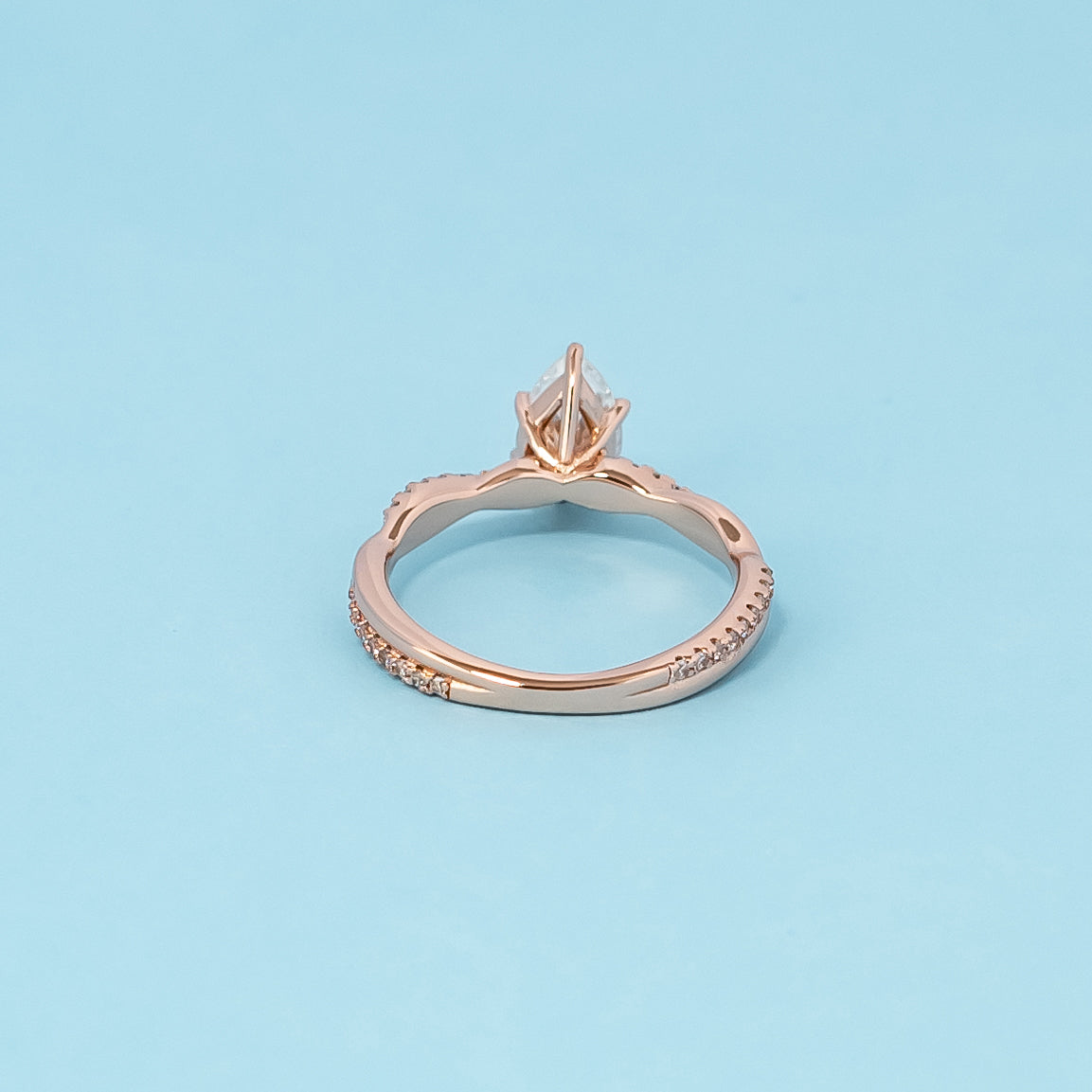 Spiral Pear Shape Moissanite Engagement Ring Set in 9ct Rose Gold