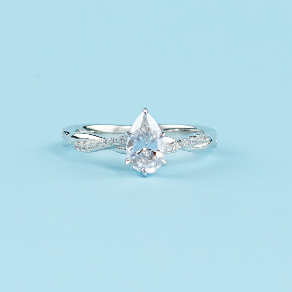Spiral Pear Shape Moissanite Engagement Ring Set in 9ct White Gold