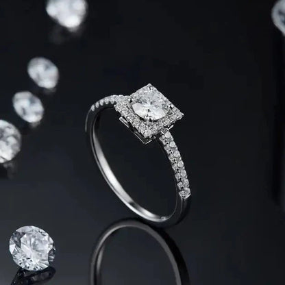 Elevé Halo 0.50ct Moissanite Engagement Ring Set in 9ct White Gold