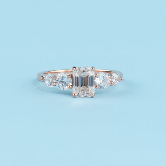 Five-Stone Emerald Cut Moissanite Engagement Ring Set in 9ct Rose Gold