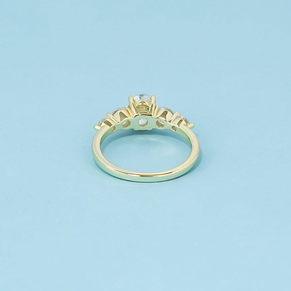 Five-Stone Oval Cut Moissanite Engagement Ring Set in 9ct Yellow Gold