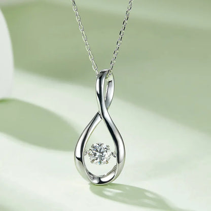 Spiral Dancing Moissanite Pendant Set in Sterling Silver