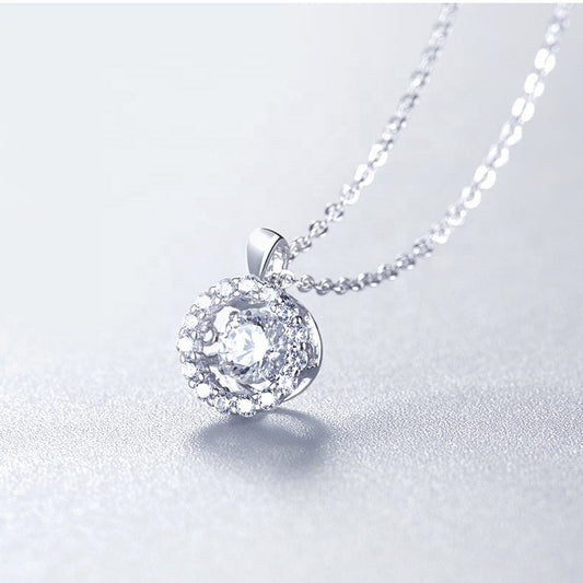 Halo Dancing Moissanite Pendant Set in Sterling Silver