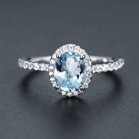 Heritage Blue Topaz Halo Ring - Oval Cut