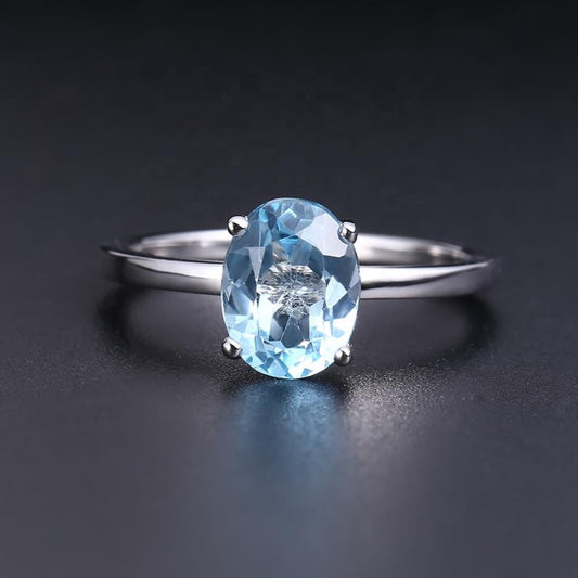 Blue Topaz Solitaire Ring - Oval Cut