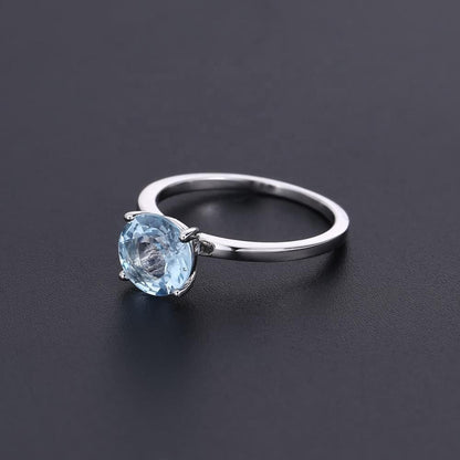 Heritage 4 Claw Blue Topaz Solitaire Ring