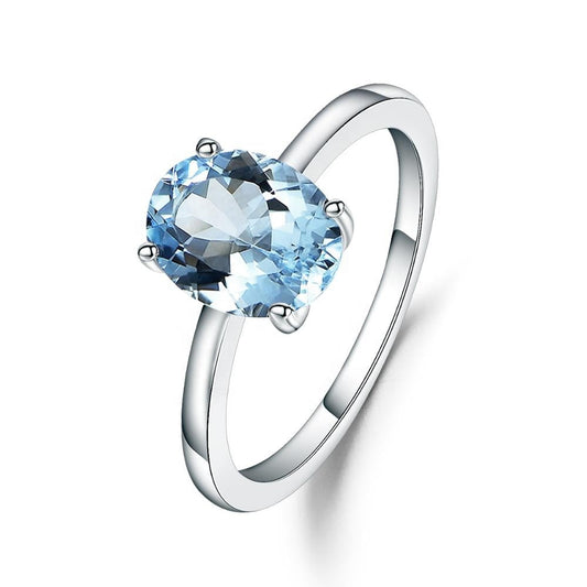 Blue Topaz Solitaire Ring - Oval Cut