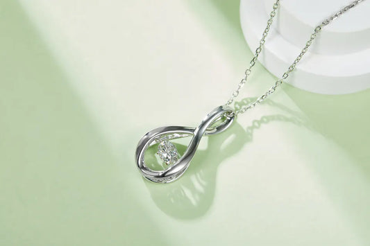 Spiral Dancing Moissanite Pendant Set in Sterling Silver