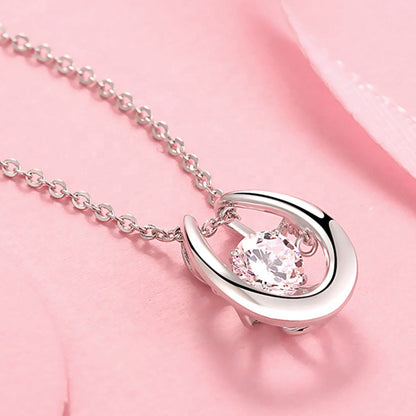 Heritage Dancing Moissanite Pendant Set in Sterling Silver