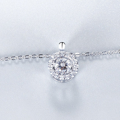 Halo Dancing Moissanite Pendant Set in Sterling Silver