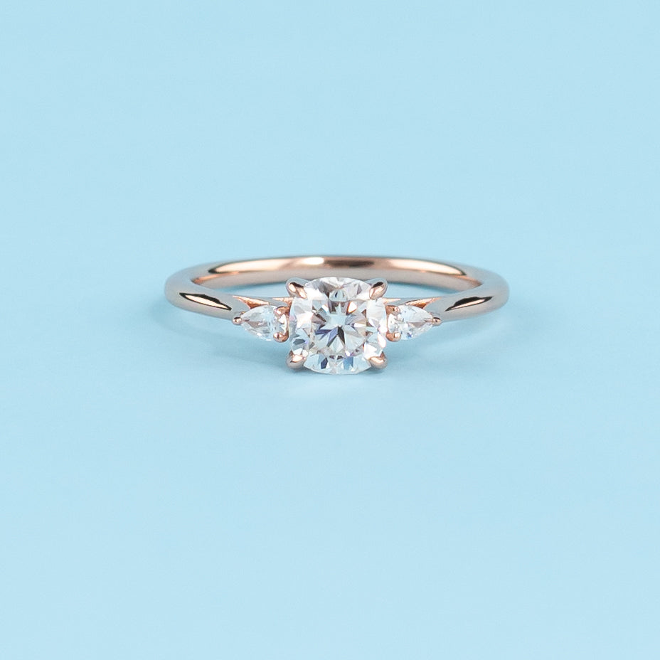 Trinity Cushion Cut Moissanite Engagement Ring Set in 9ct Rose Gold