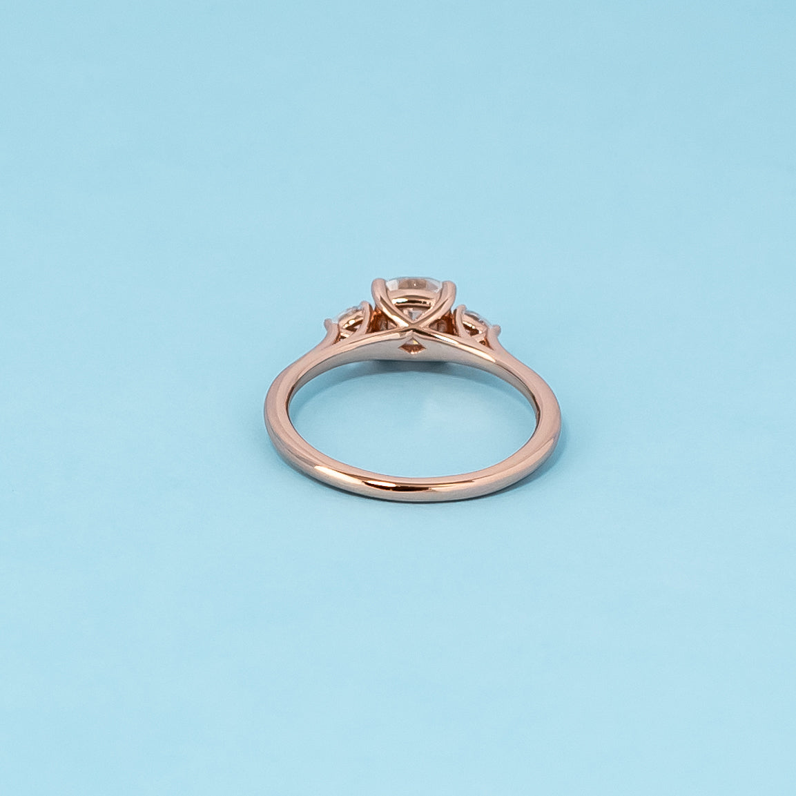 Trinity Cushion Cut Moissanite Engagement Ring Set in 9ct Rose Gold