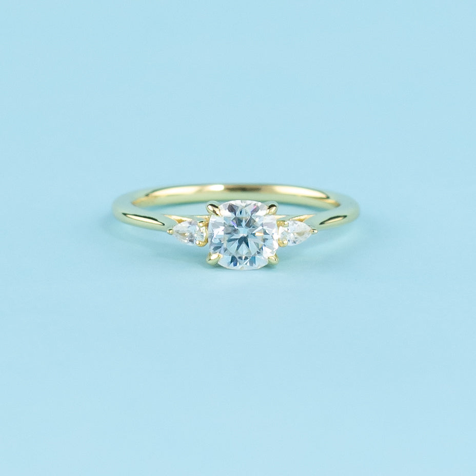 Trinity Cushion Cut Moissanite Engagement Ring Set in 9ct Yellow Gold