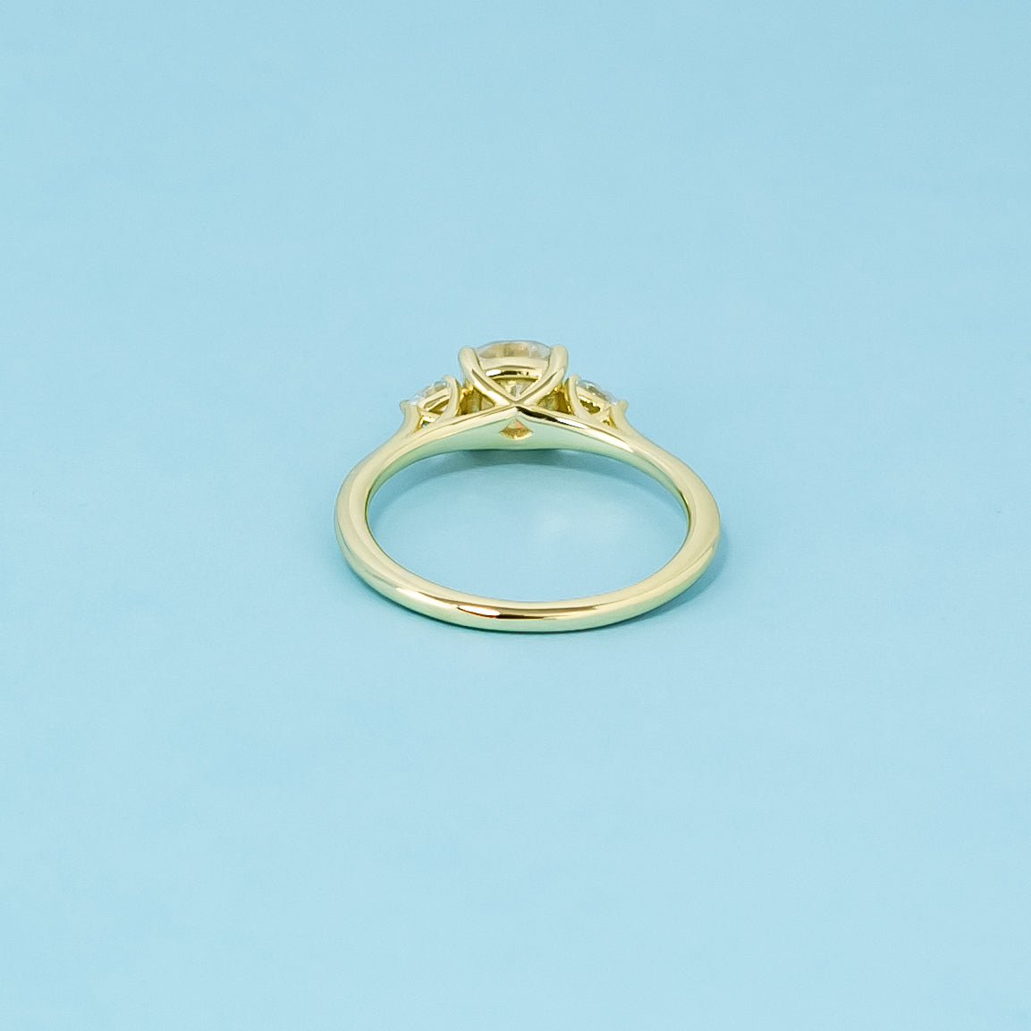 Trinity Cushion Cut Moissanite Engagement Ring Set in 9ct Yellow Gold