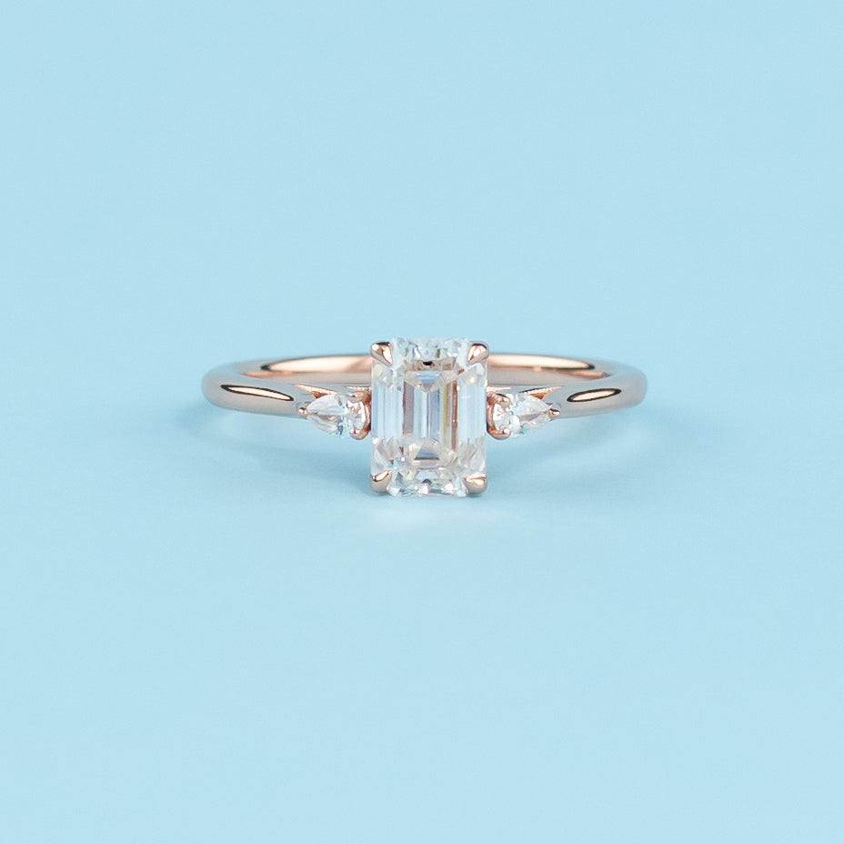 Trinity Emerald Cut Moissanite Engagement Ring Set in 9ct Rose Gold