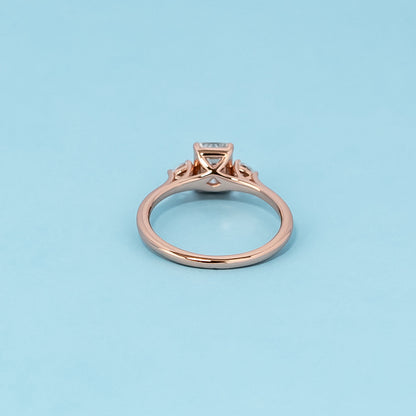 Trinity Emerald Cut Moissanite Engagement Ring Set in 9ct Rose Gold