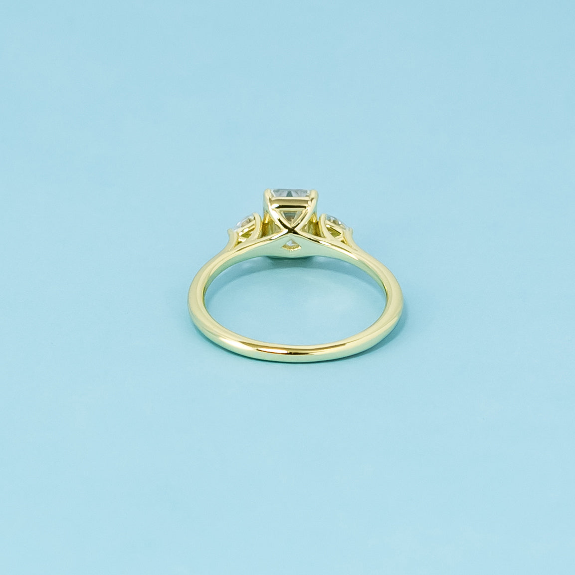 Trinity Emerald Cut Moissanite Engagement Ring Set in 9ct Yellow Gold