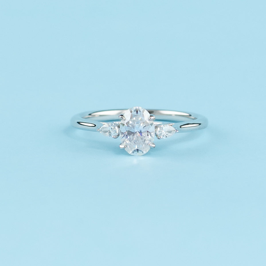 Trinity Oval Cut Moissanite Engagement Ring Set in 9ct White Gold